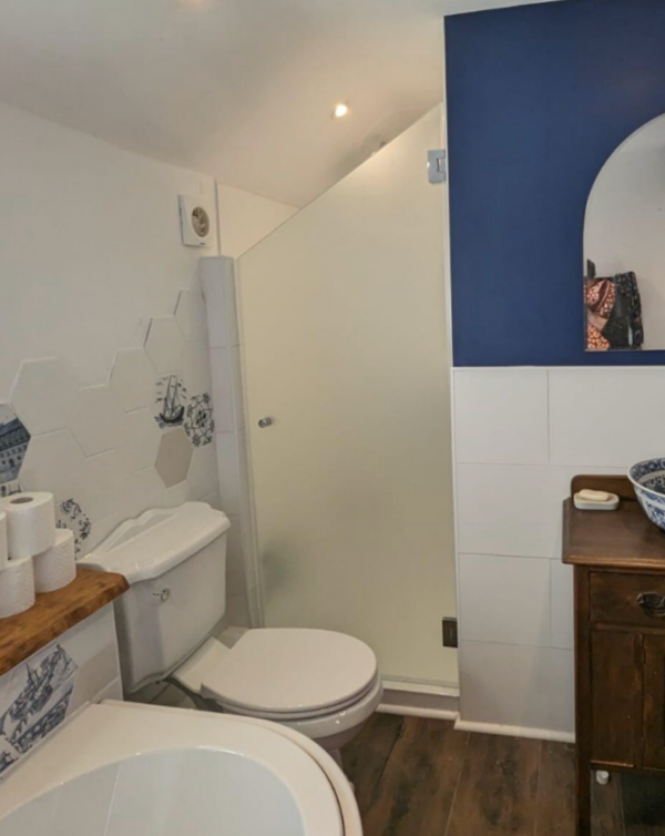 right handed shower door for a bathroom withy sloping roof.